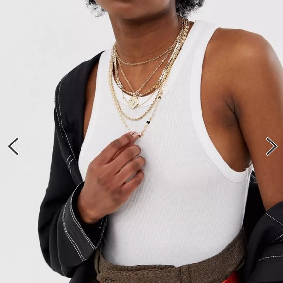 ASOS DESIGN multirow necklace mixed design chains and molten coin pendant - Picture 3 of 5